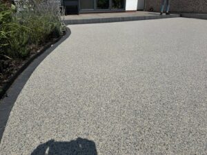 Low maintenance resin patio replacing a lawn in St Annes