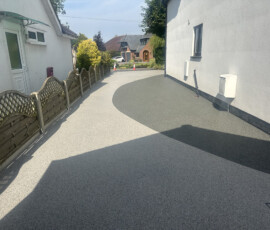 Modern resin bound driveway finish outside home in Little Eccleston